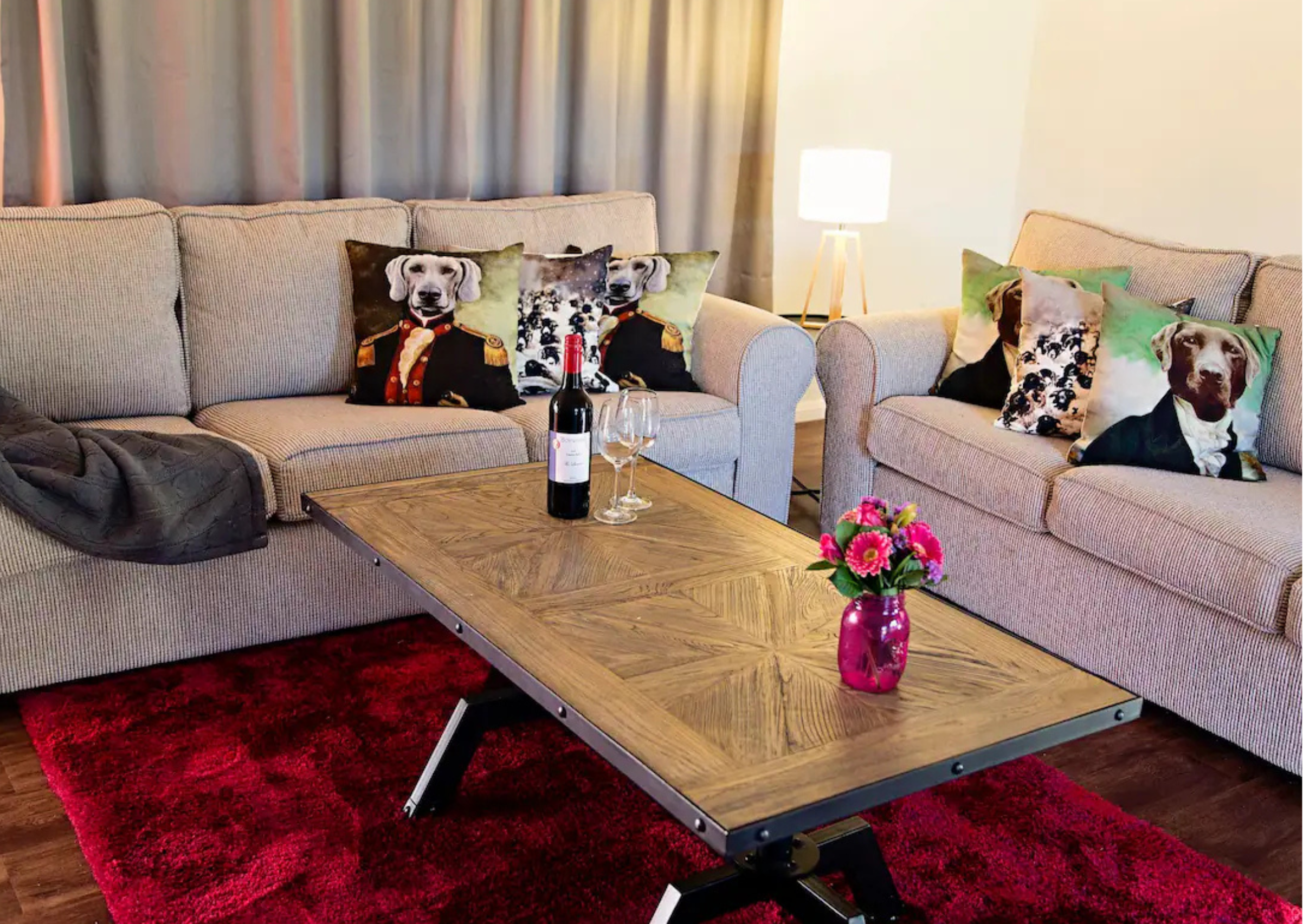 The spacious and comfortable lounge area at our Dalcouth retreat, with two large sofas perfect for groups to relax after a day exploring the Granite Belt.