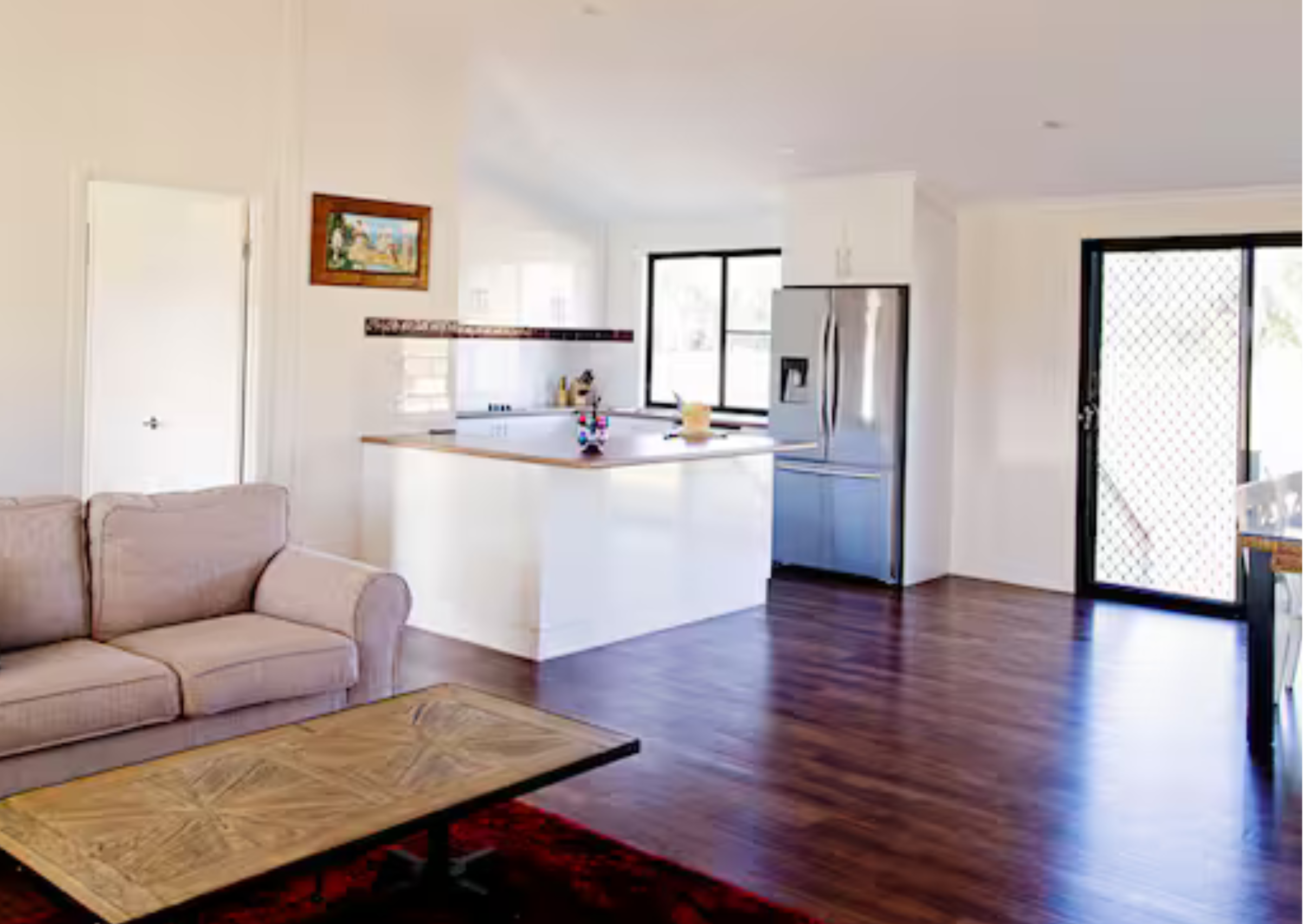 The kitchen featuring a large double-door fridge and walk-in pantry at our self-contained Stanthorpe accommodation.