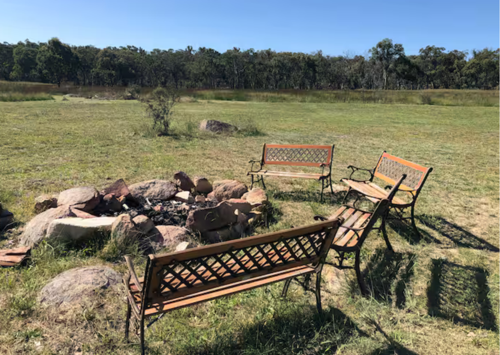 The large outdoor fire pit at Country Homestead Retreats, a perfect spot for groups to gather in the evening.